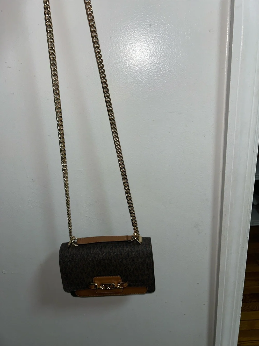 Like new Michael Kors Brown Logo Crossbody with Tan Leather and Gold Chain